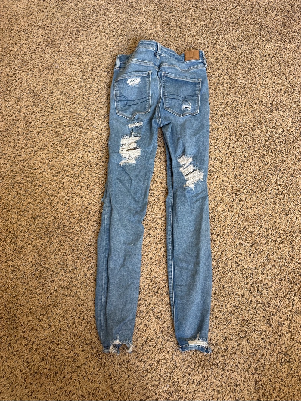 American Eagle Outfitters Light Blue Ripped Skinny Jeans